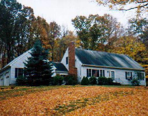 147 Hogs Back Road Oxford, CT 06478 - Photo 1 of 1 a view of a house with a yard