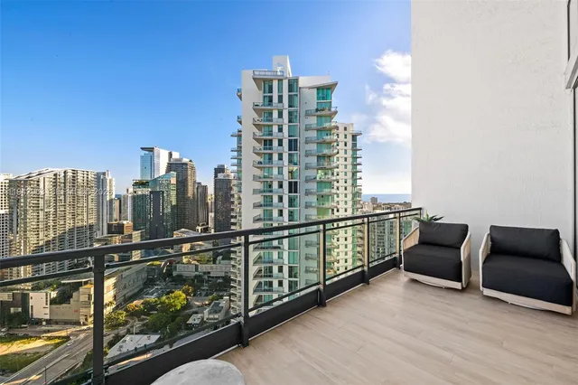 a bathroom with a toilet and shower