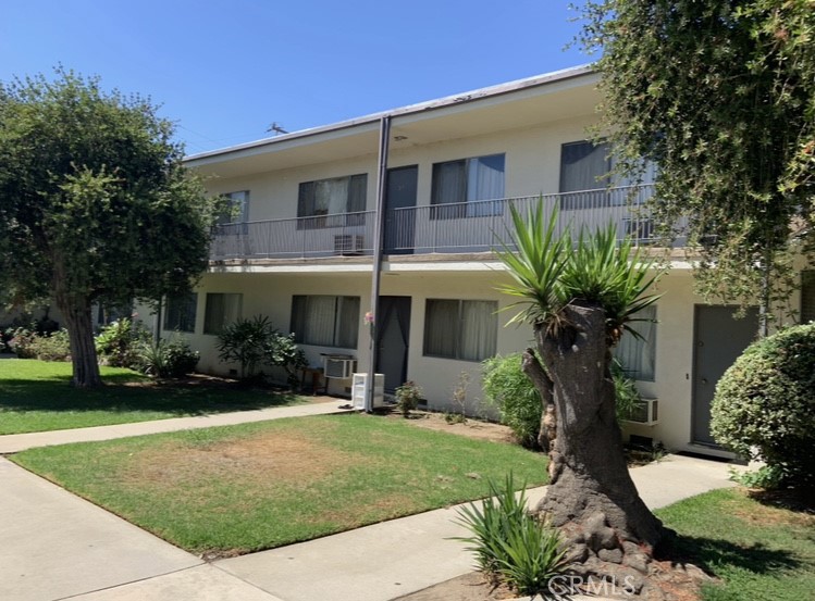 425 Fairview Avenue, Unit 35 Arcadia, CA 91007 - Photo 4 of 6 a front view of a house with a yard and potted plants