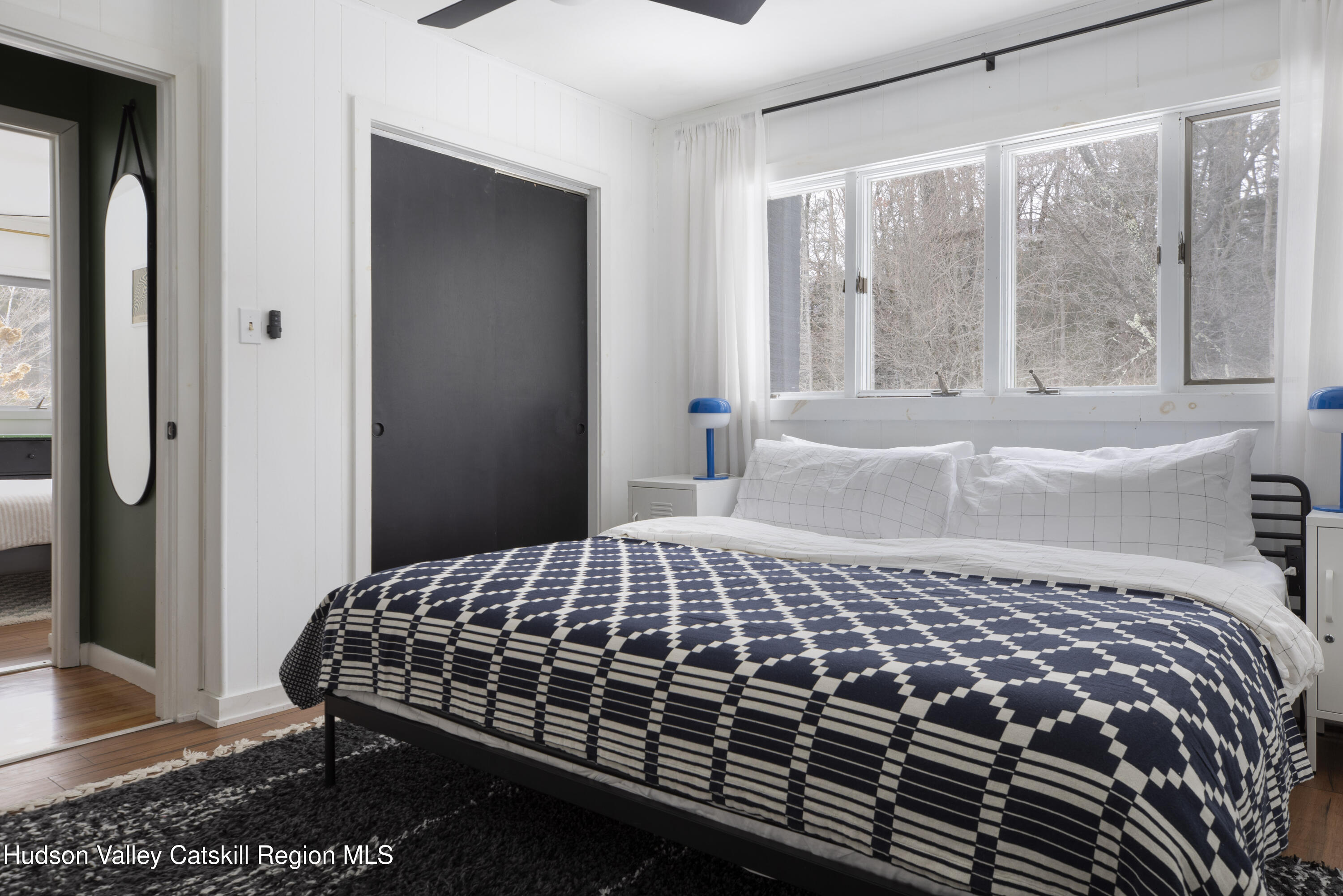 26 Krom Road Olivebridge, NY 12461 - Photo 17 of 24 a bedroom with a bed and wooden floor