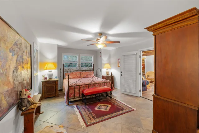 a bed room with a bed and a window