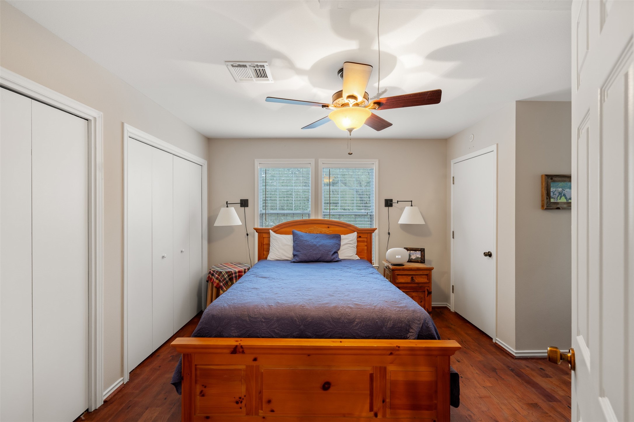 1131 Greak Road Weimar, TX 78962 - Photo 15 of 42 a large bedroom with a bed and wooden floor