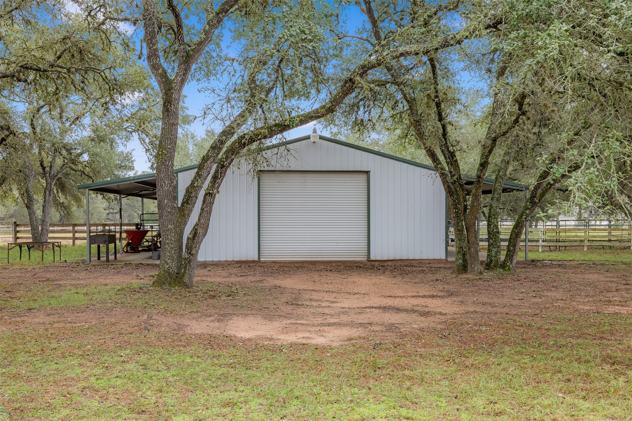 1131 Greak Road Weimar, TX 78962 - Photo 40 of 42 a house with trees in front of it