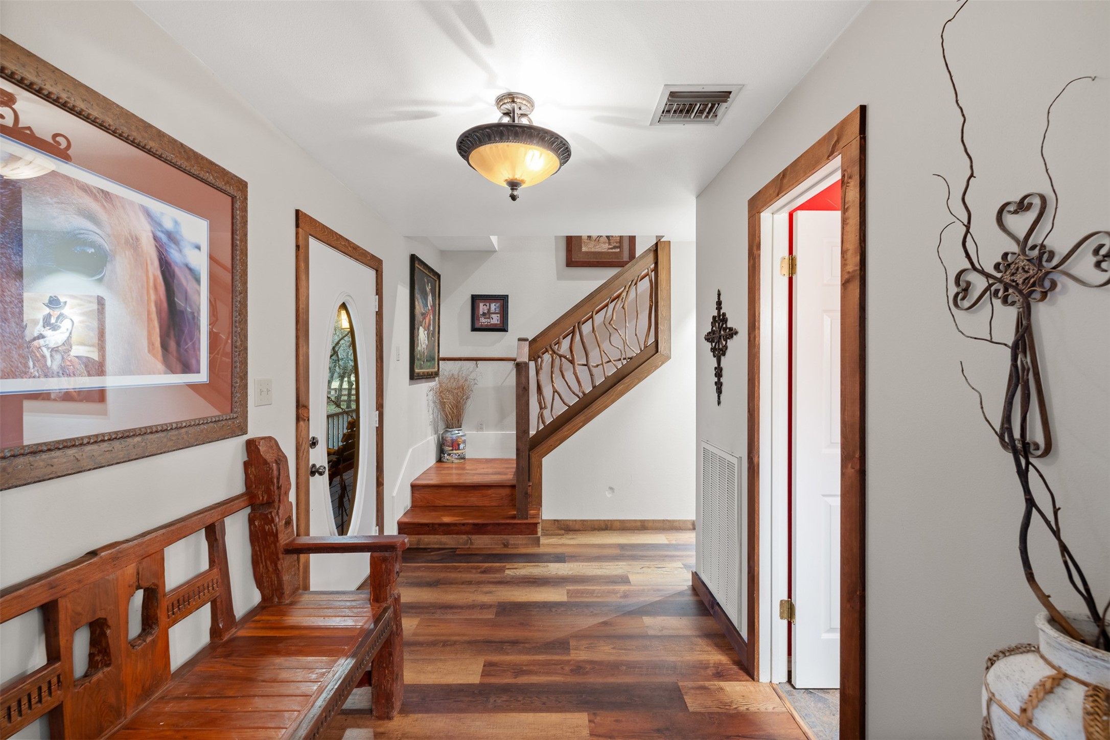 1131 Greak Road Weimar, TX 78962 - Photo 6 of 42 a view of an entryway with wooden floor