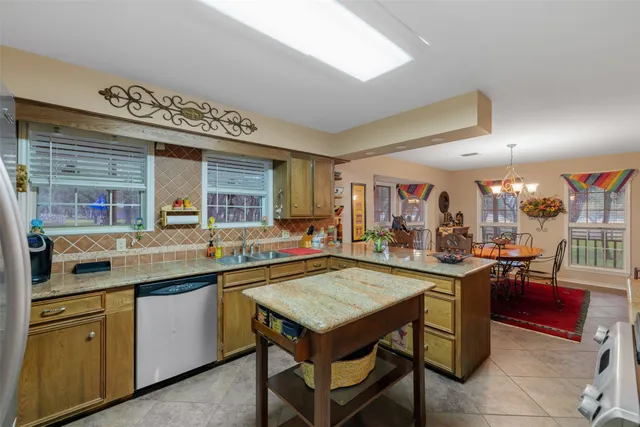 a kitchen with a sink and counter space