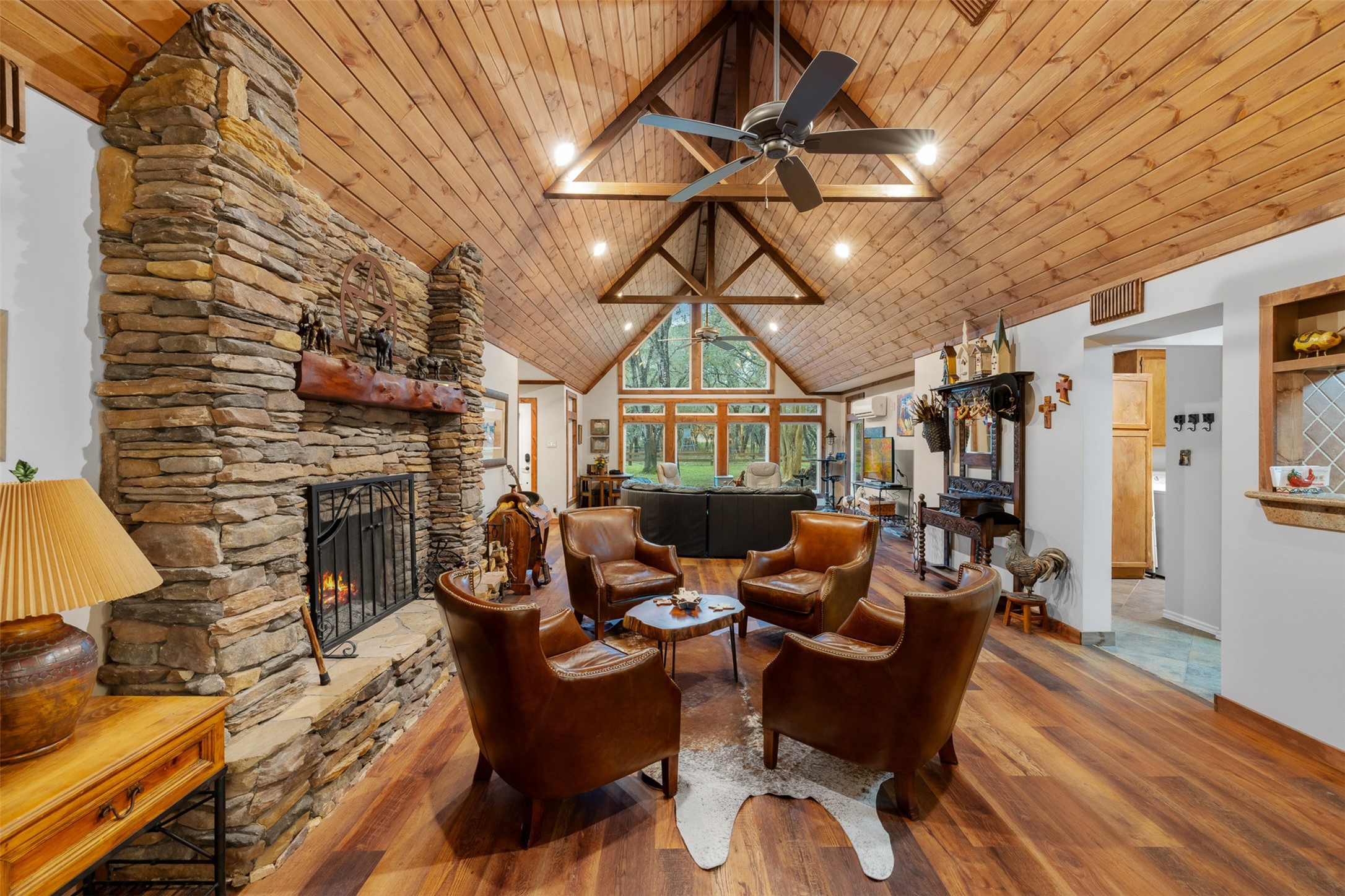 1131 Greak Road Weimar, TX 78962 - Photo 10 of 42 a living room with furniture a fireplace and wooden floor
