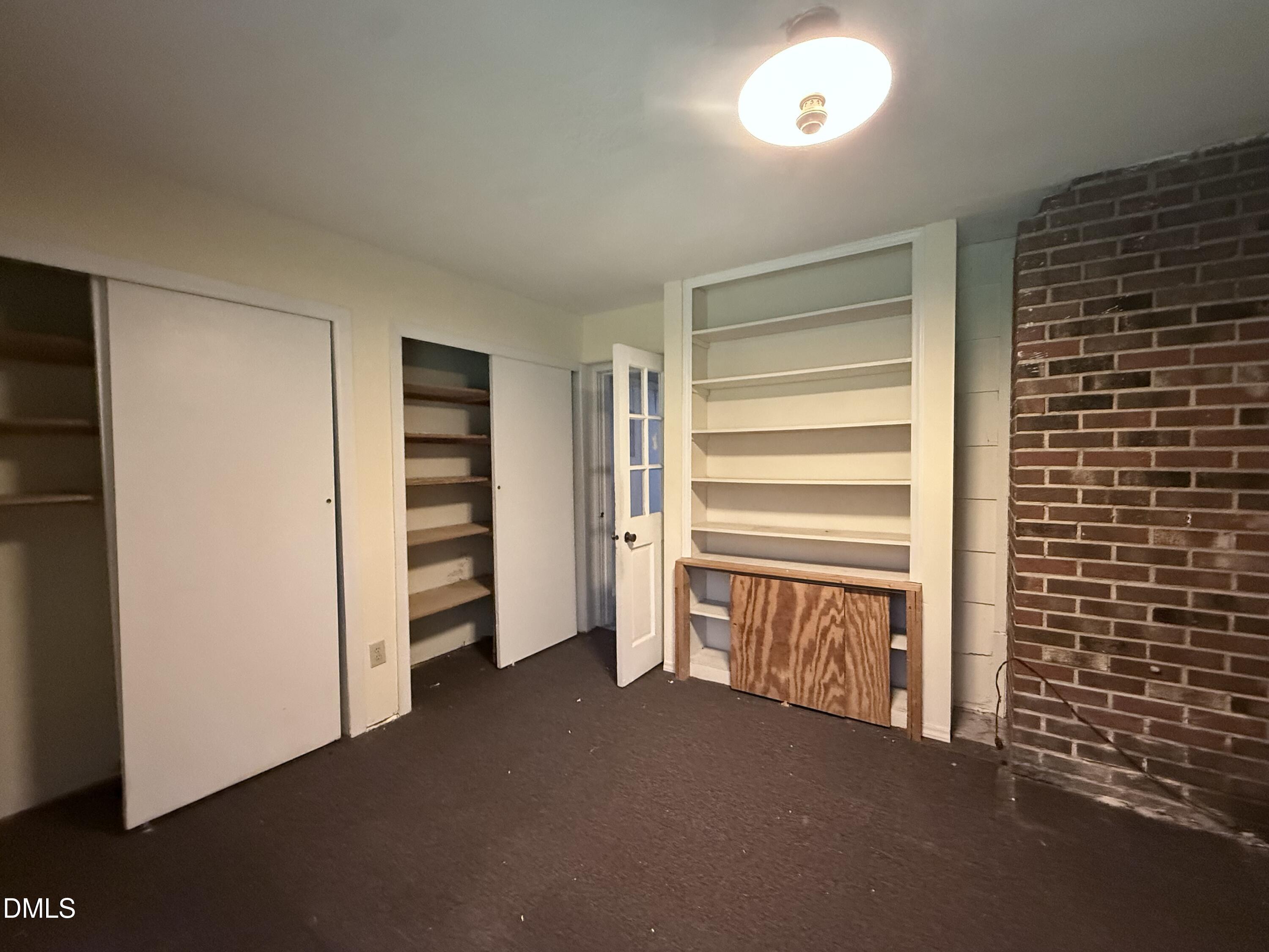 1010 Wyldewood Road Durham, NC 27704 - Photo 11 of 26 a view of empty room with a fireplace
