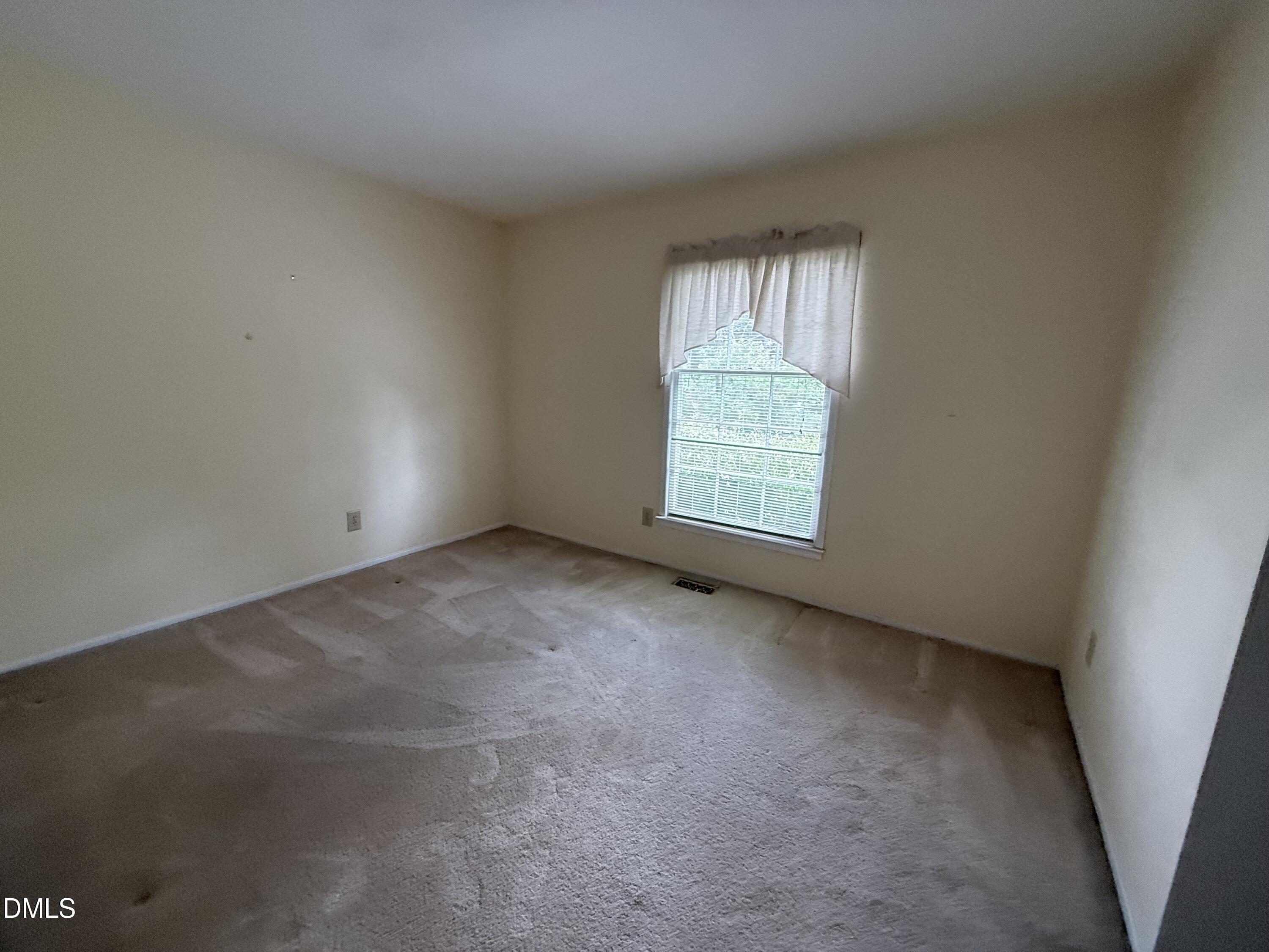 1010 Wyldewood Road Durham, NC 27704 - Photo 17 of 26 an empty room with windows