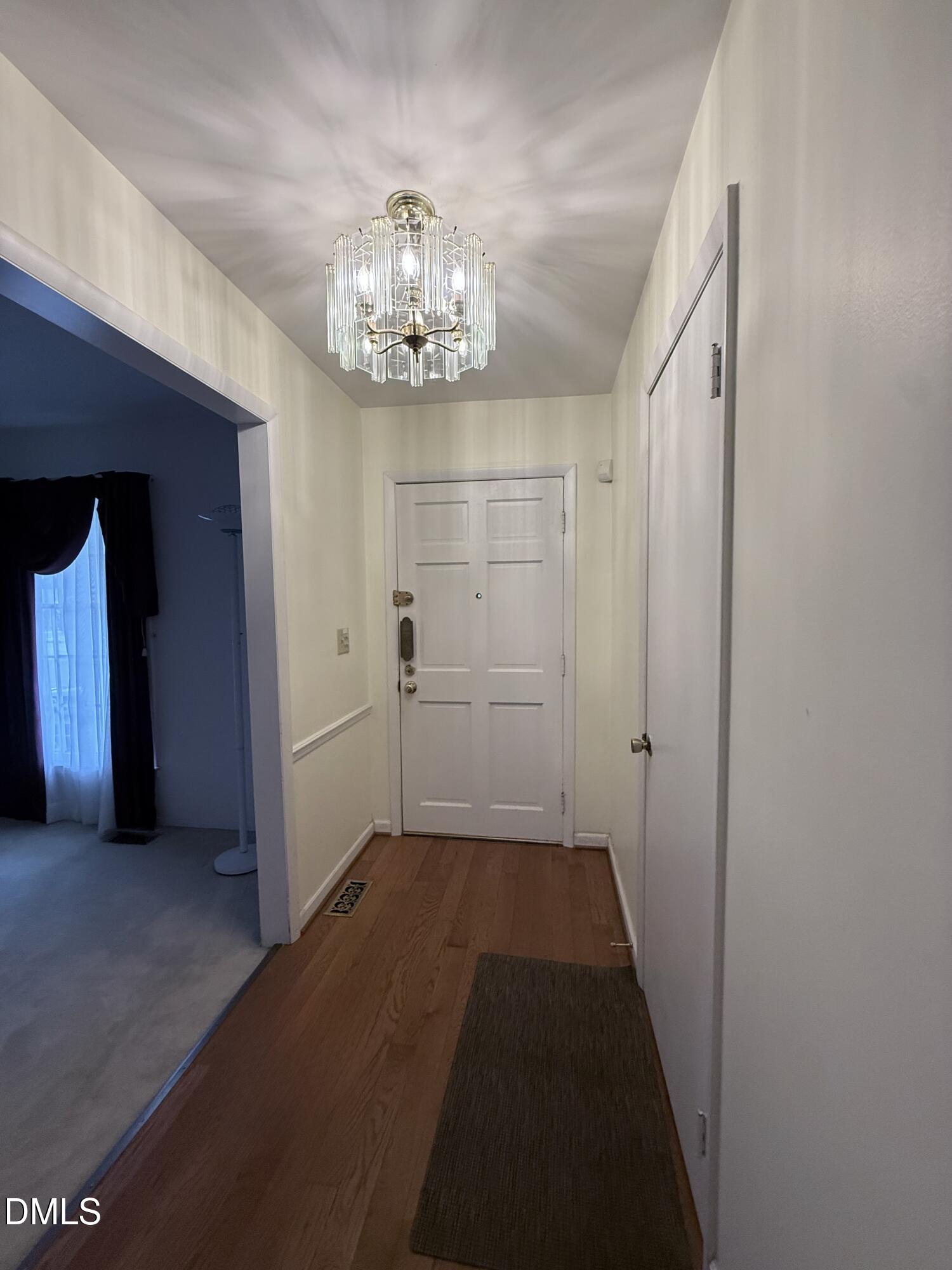 1010 Wyldewood Road Durham, NC 27704 - Photo 2 of 26 a view of a chandelier in a room
