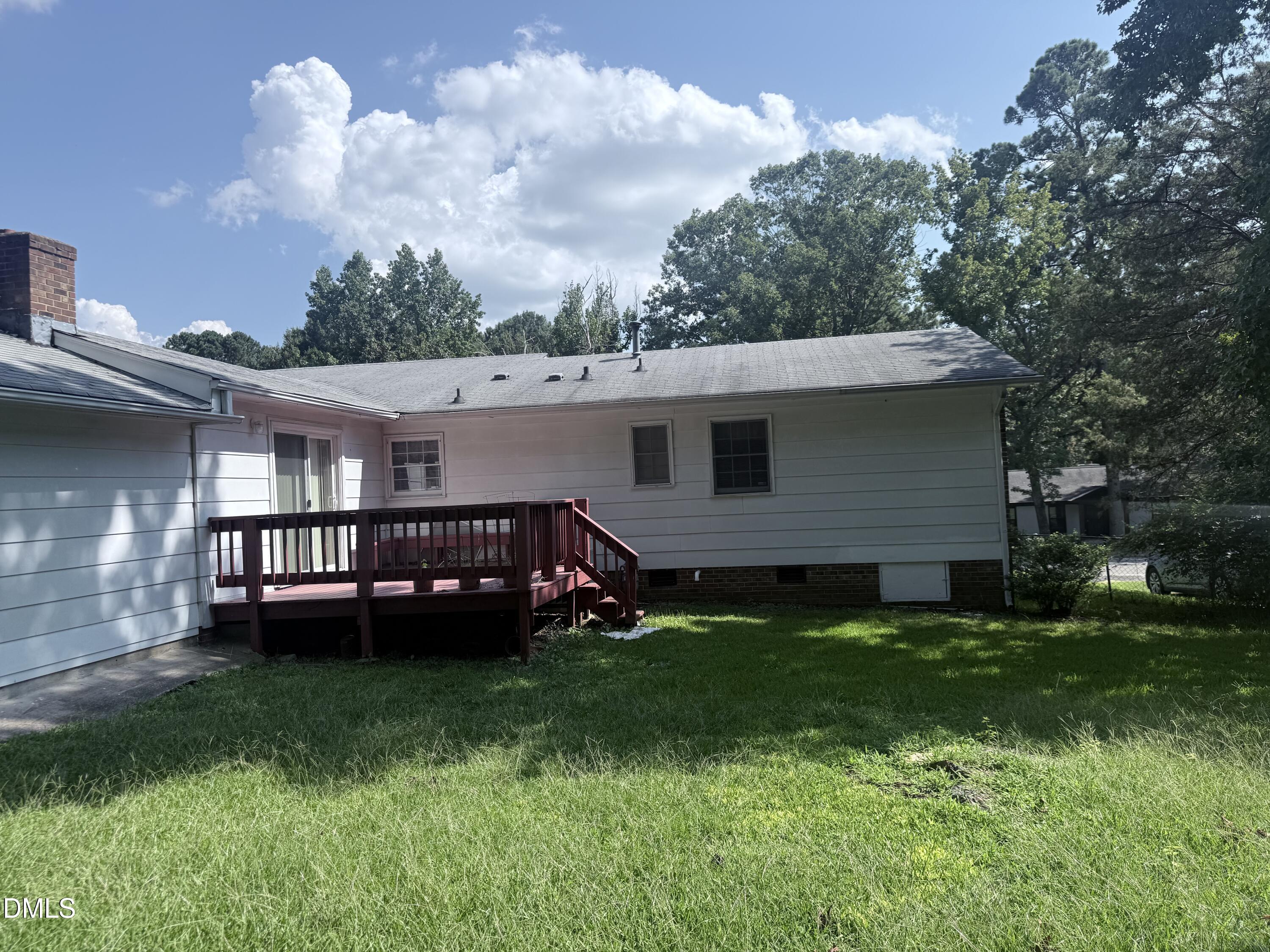 1010 Wyldewood Road Durham, NC 27704 - Photo 21 of 26 a view of a house with a backyard