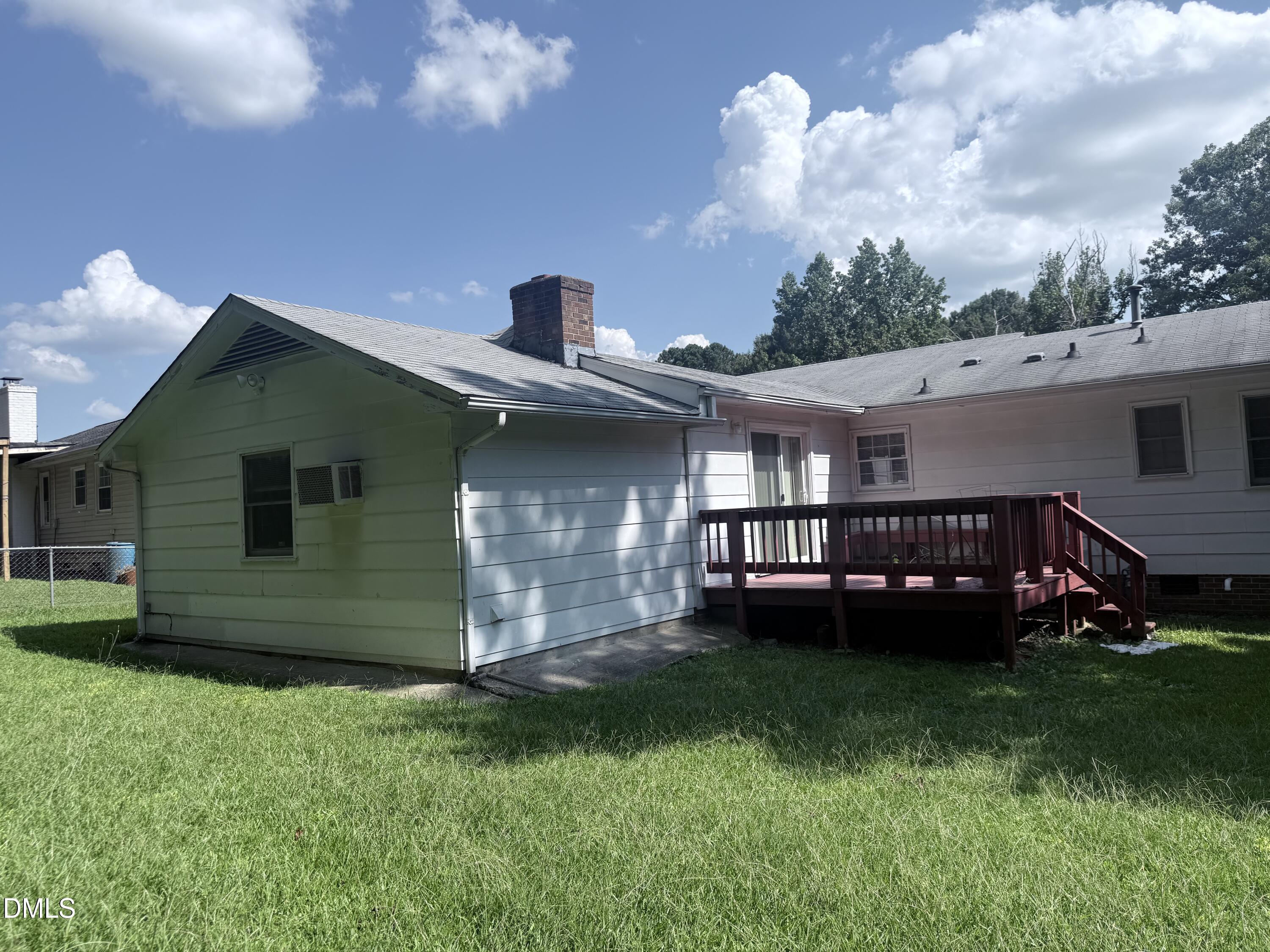 1010 Wyldewood Road Durham, NC 27704 - Photo 22 of 26 a view of a house with a backyard