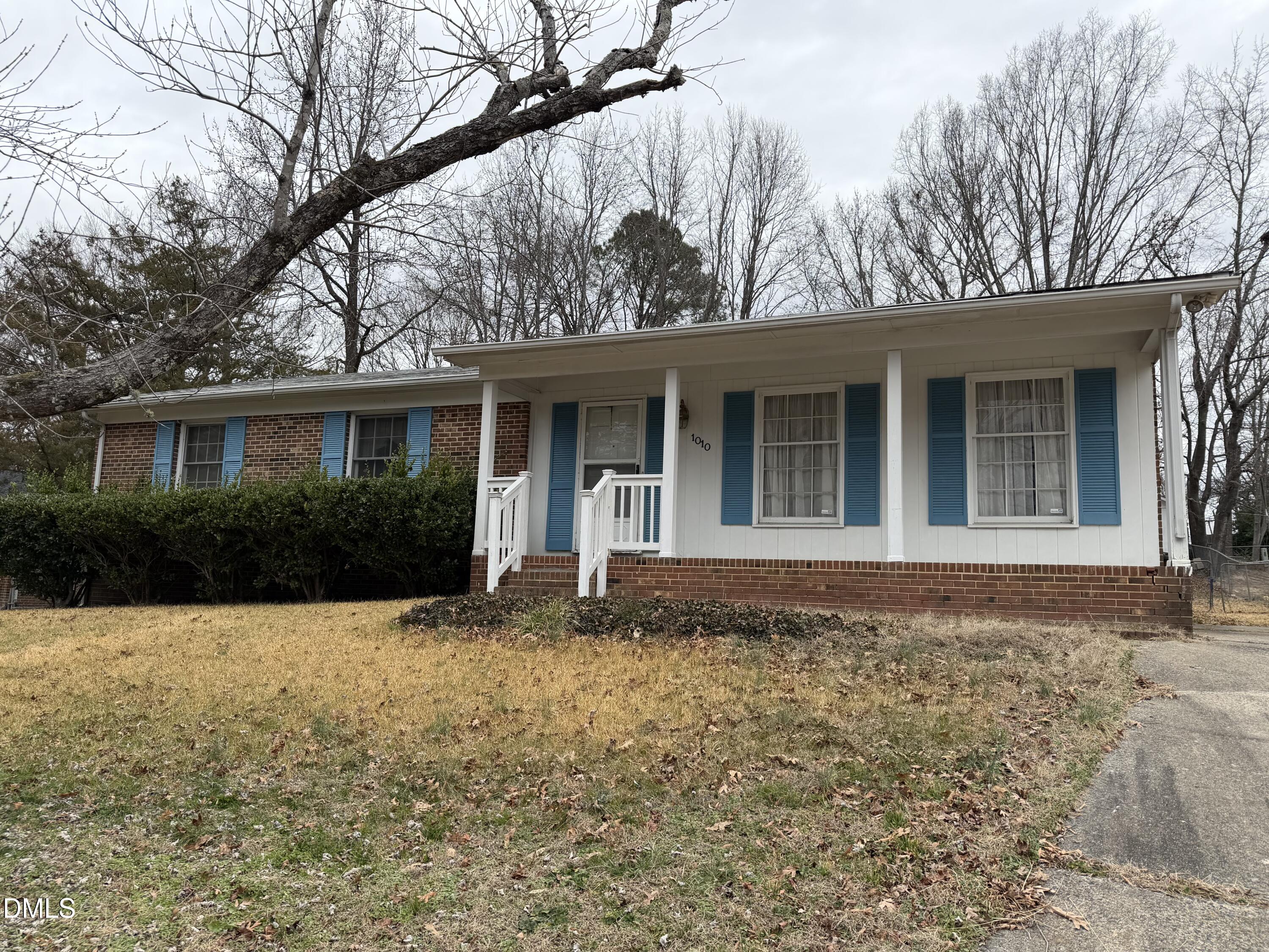 1010 Wyldewood Road Durham, NC 27704 - Photo 24 of 26 a house with trees in the background