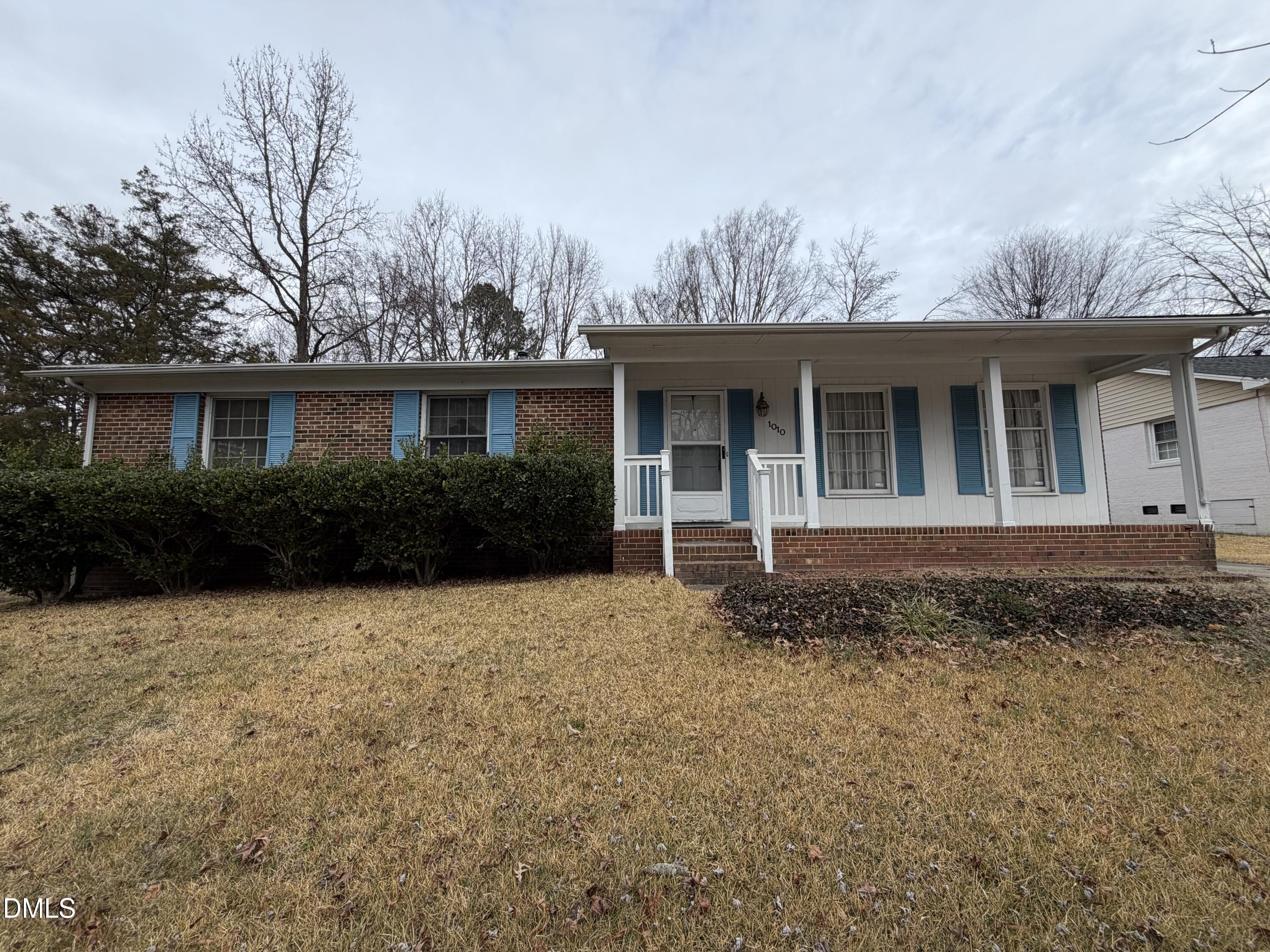 1010 Wyldewood Road Durham, NC 27704 - Photo 26 of 26 a front view of a house with garden
