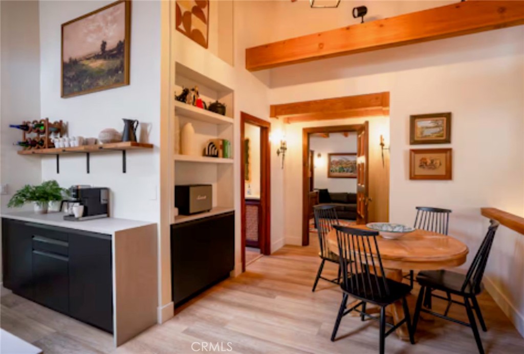 764 Fern Road Lake Arrowhead, CA 92385 - Photo 11 of 60 a dining room with furniture and window