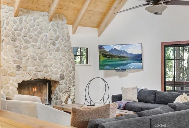 a view of balcony with furniture and wooden floor