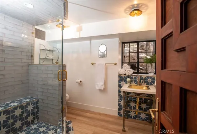 a bathroom with a bathtub and a toilet