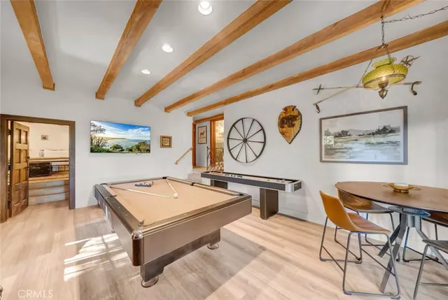 a view of a house with a yard and wooden roof