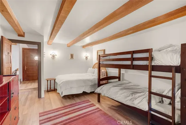 a kitchen with a stove and a refrigerator