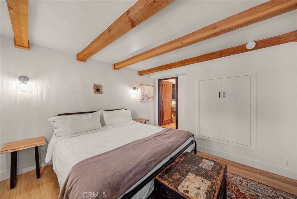 764 Fern Road Lake Arrowhead, CA 92385 - Photo 45 of 60 a bedroom with a bed and a dresser