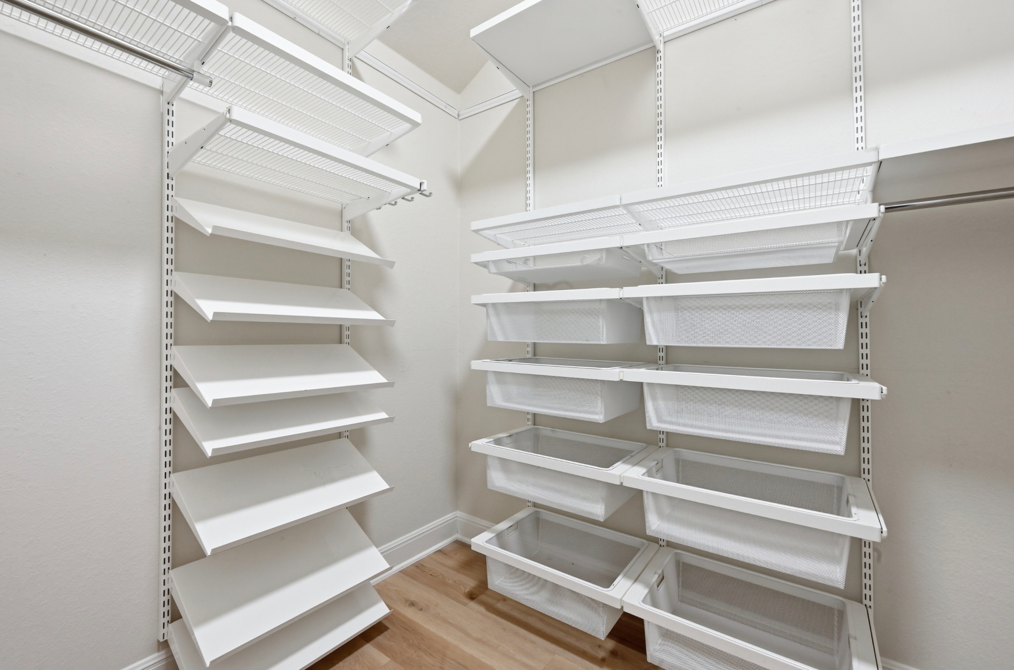 13009 Olivers Way Manchaca, TX 78652 - Photo 21 of 37 a view of walk in closet with empty racks