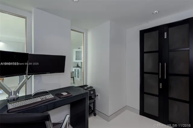 a room with furniture and flat screen tv