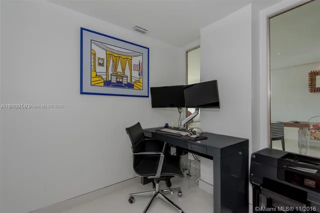 a view of a workspace with furniture