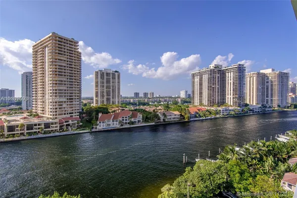 a view of a city with tall buildings