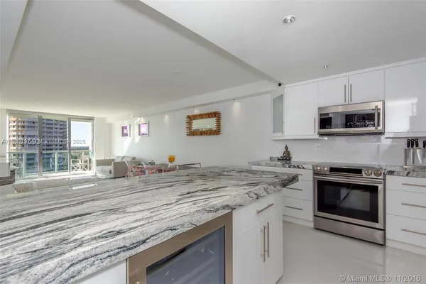 a kitchen with a stove and a microwave