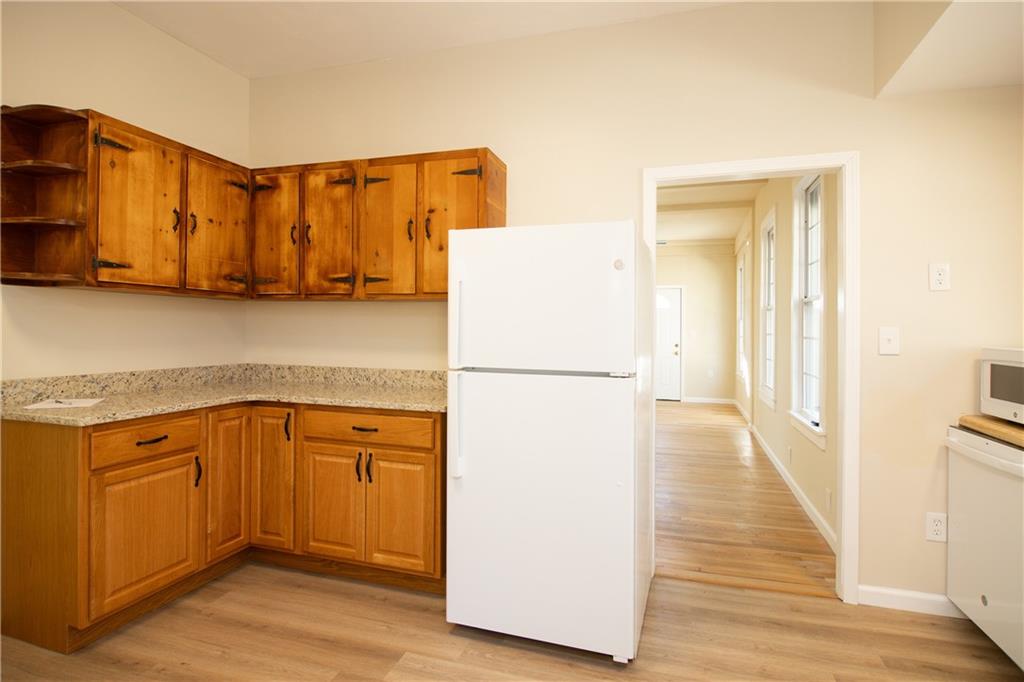 163 Rabbit Town Road Tate, GA 30177 - Photo 13 of 32 a kitchen with a refrigerator a stove top oven a sink and dishwasher