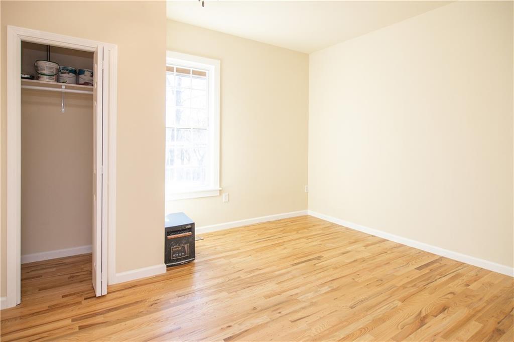 163 Rabbit Town Road Tate, GA 30177 - Photo 22 of 32 a view of empty room with wooden floor
