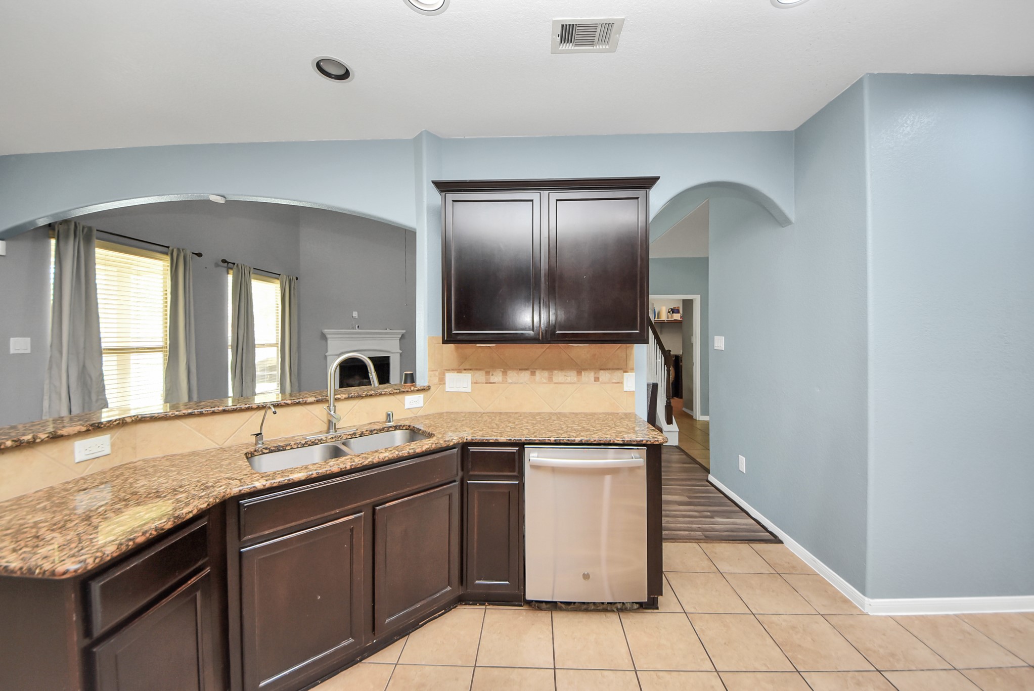 33227 Greenfield Forest Drive Spring, TX 77382 - Photo 15 of 50 a kitchen with a sink and cabinets
