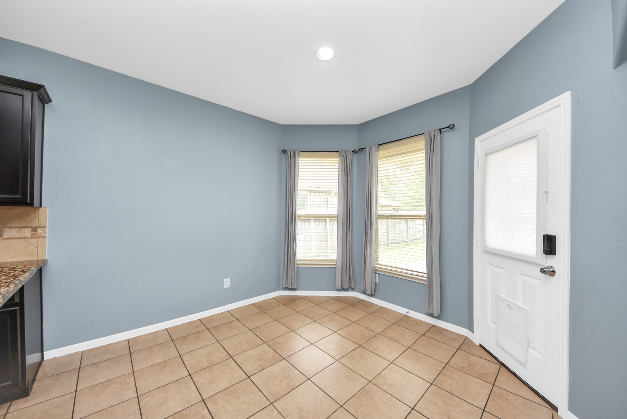 33227 Greenfield Forest Drive Spring, TX 77382 - Photo 20 of 50 a bedroom with a bed and a window