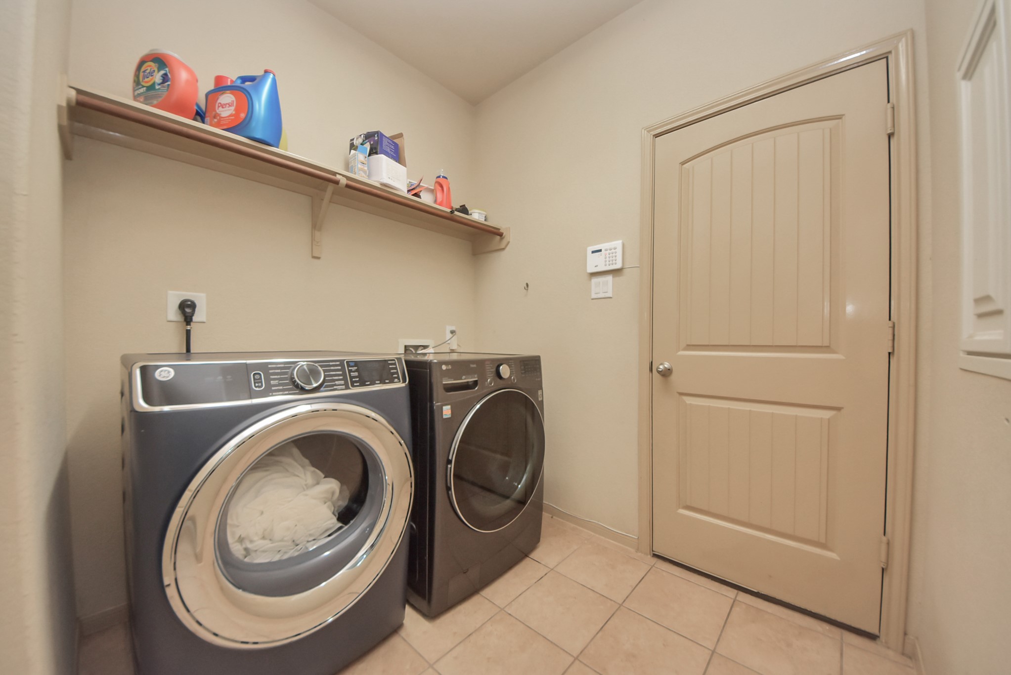 33227 Greenfield Forest Drive Spring, TX 77382 - Photo 31 of 50 a utility room with dryer and washer