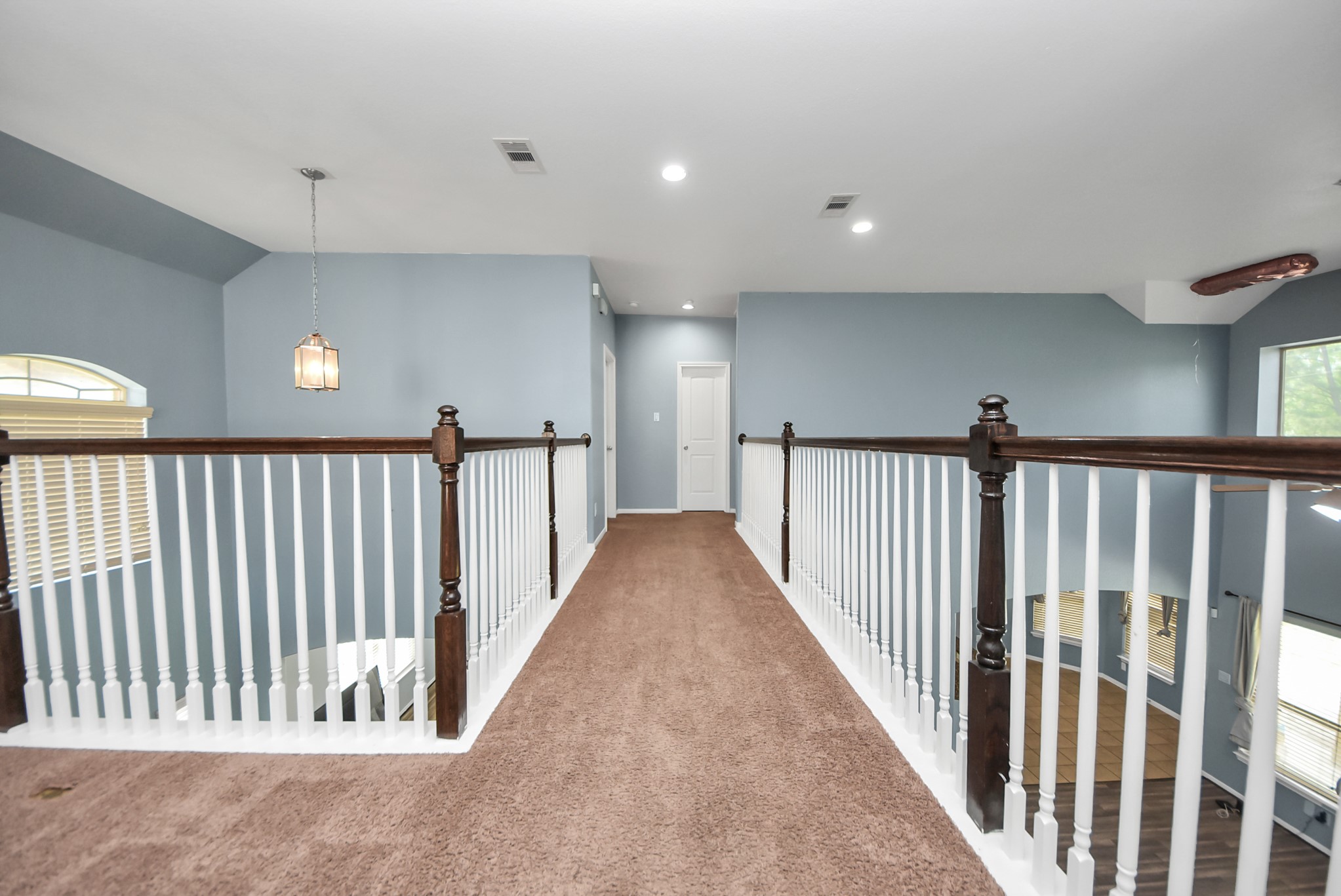 33227 Greenfield Forest Drive Spring, TX 77382 - Photo 32 of 50 a view of a hallway with a window
