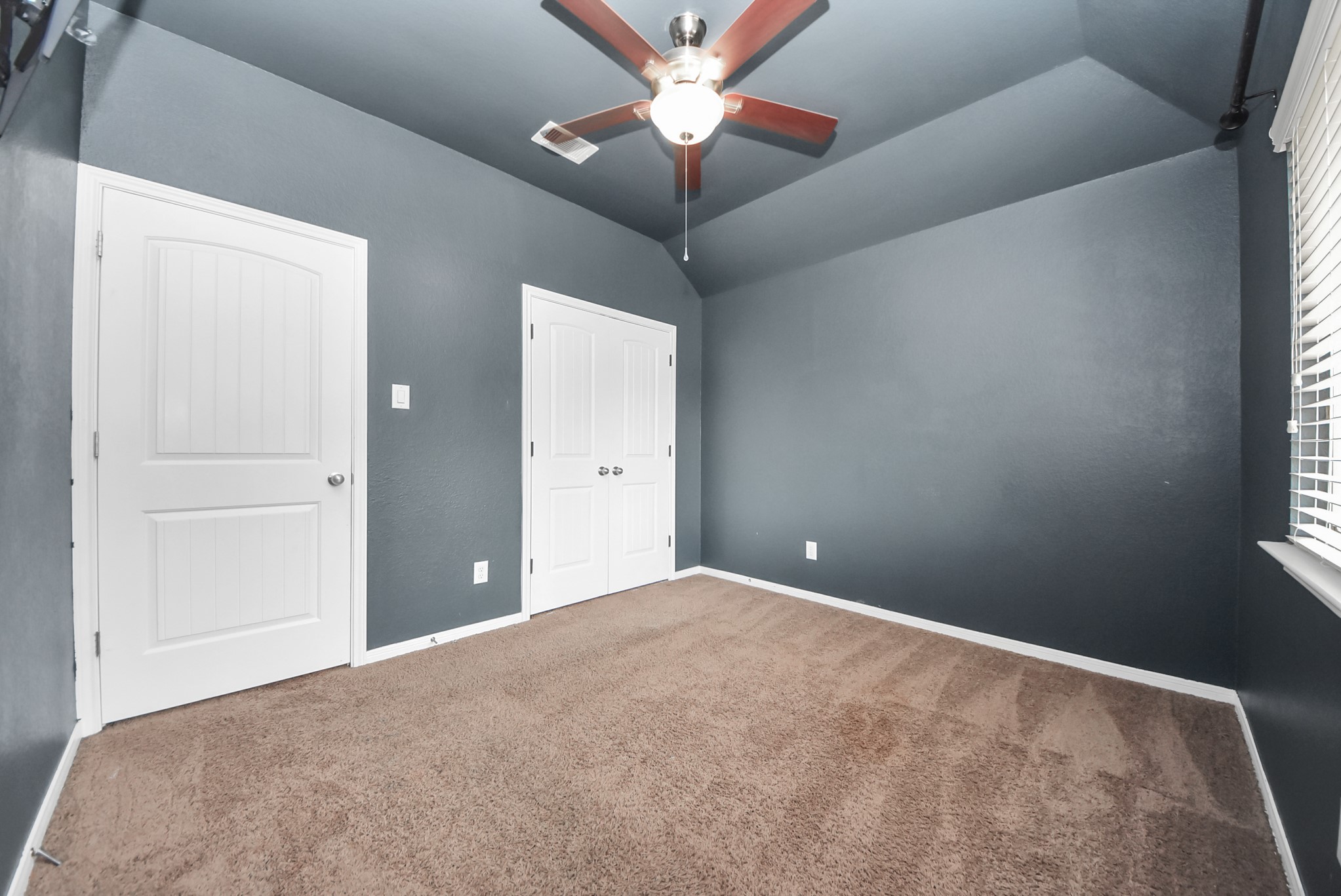 33227 Greenfield Forest Drive Spring, TX 77382 - Photo 37 of 50 a view of a livingroom with a chandelier fan