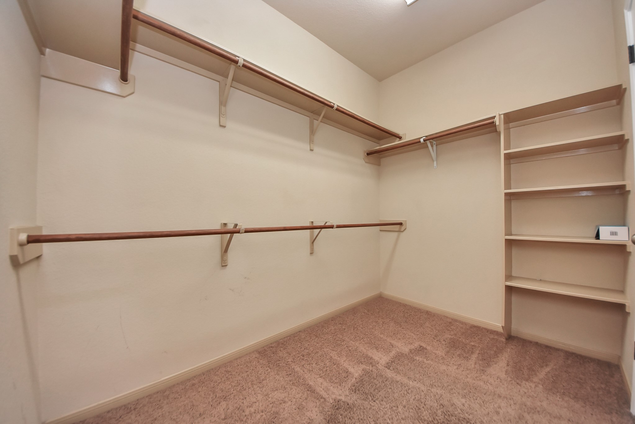 33227 Greenfield Forest Drive Spring, TX 77382 - Photo 47 of 50 a view of an empty walk in closet
