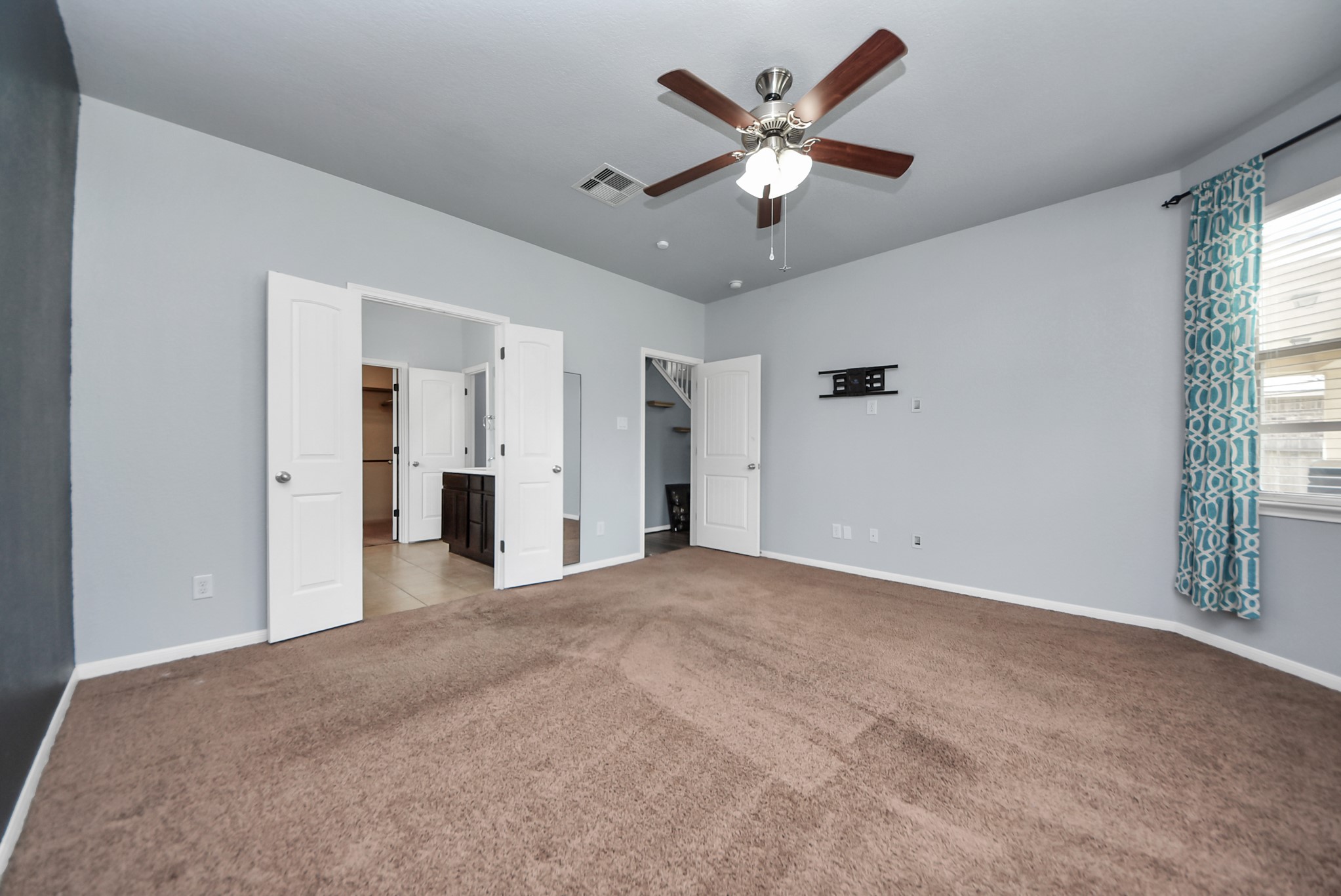 33227 Greenfield Forest Drive Spring, TX 77382 - Photo 49 of 50 an empty room with chandelier and windows