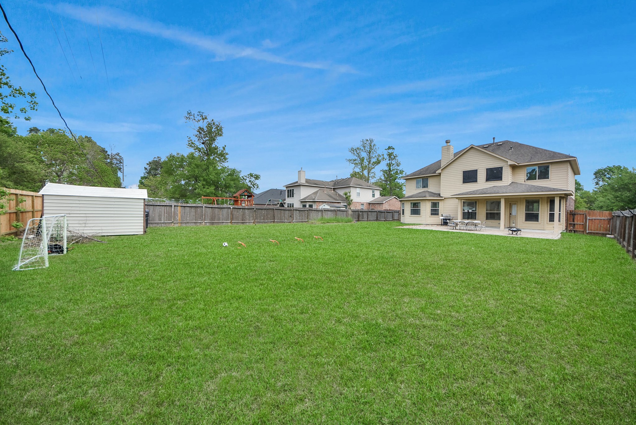 33227 Greenfield Forest Drive Spring, TX 77382 - Photo 5 of 50 a front view of a house with a yard