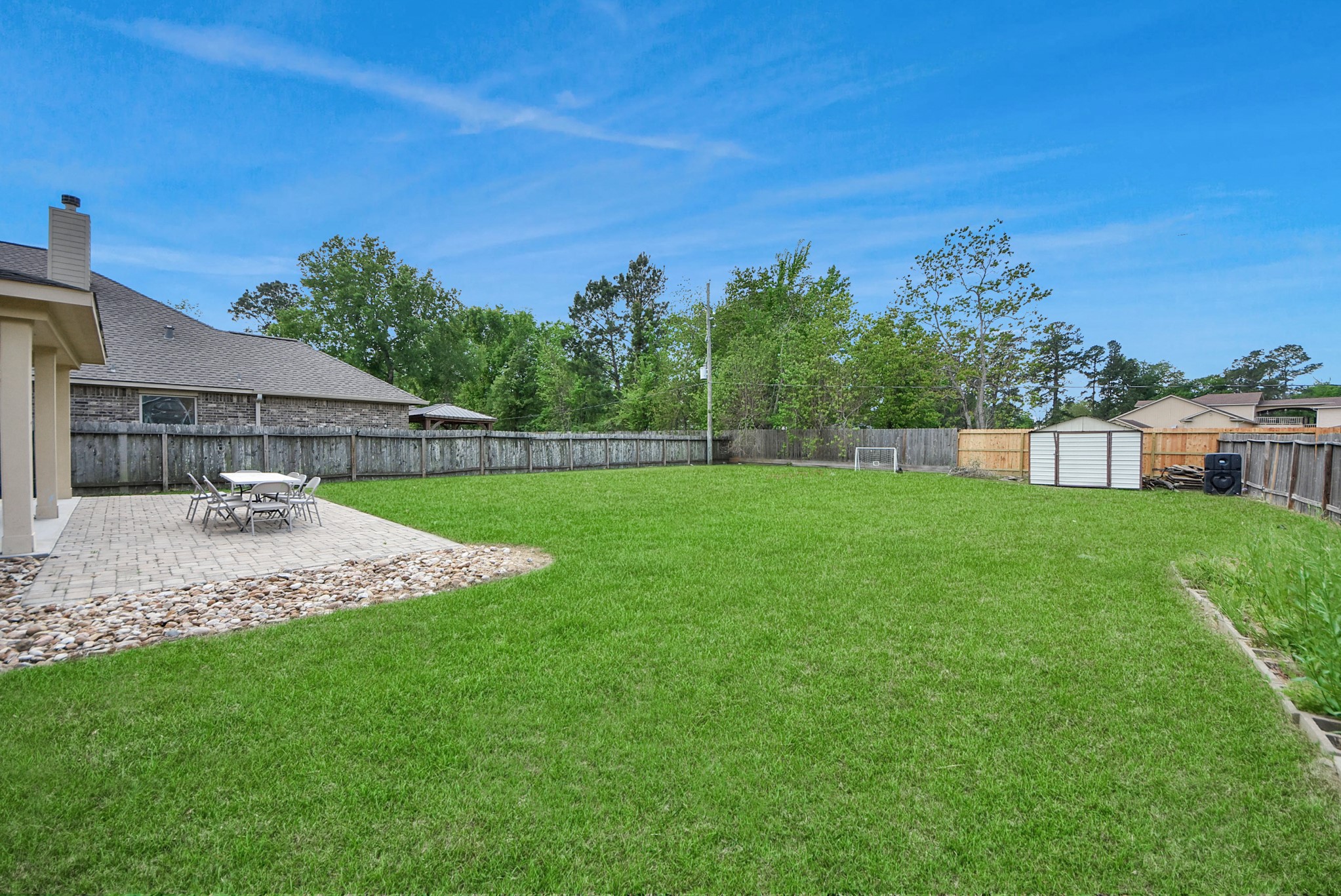 33227 Greenfield Forest Drive Spring, TX 77382 - Photo 6 of 50 a view of a house with a yard and sitting area
