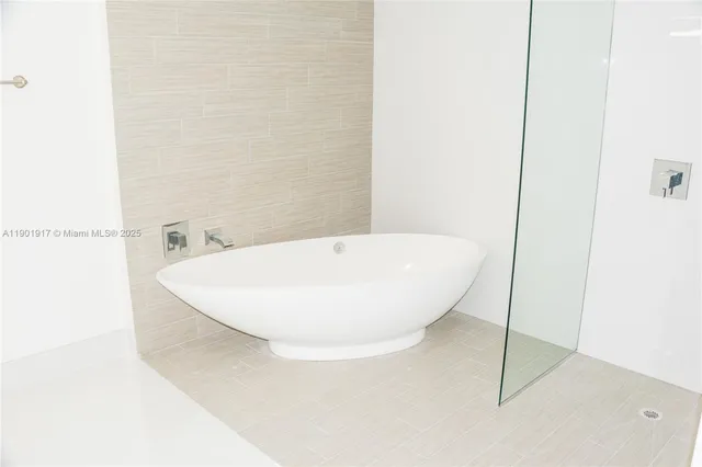 a view of a bathtub in a bathroom