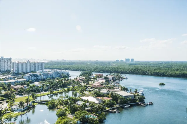 a view of a lake with houses
