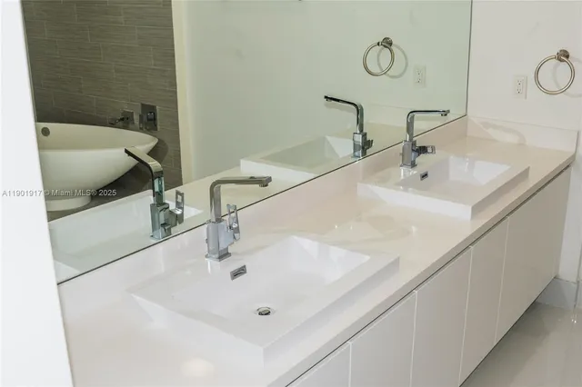 a bathroom with a sink and a tub