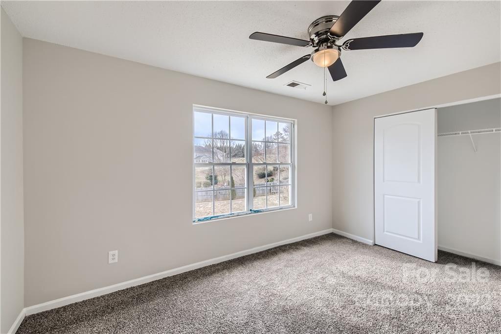 7005 Copper Ridge Court Gastonia, NC 28056 - Photo 24 of 33 a view of an empty room with a window