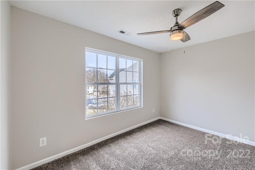 7005 Copper Ridge Court Gastonia, NC 28056 - Photo 25 of 33 an empty room with windows