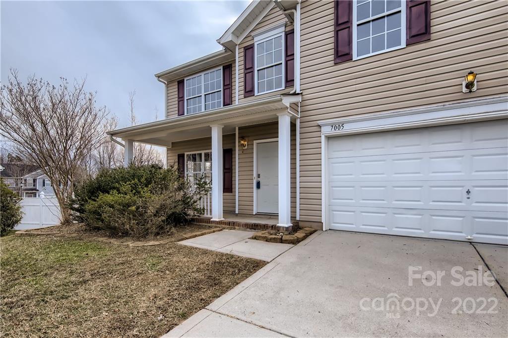 7005 Copper Ridge Court Gastonia, NC 28056 - Photo 29 of 33 a front view of a house with a yard