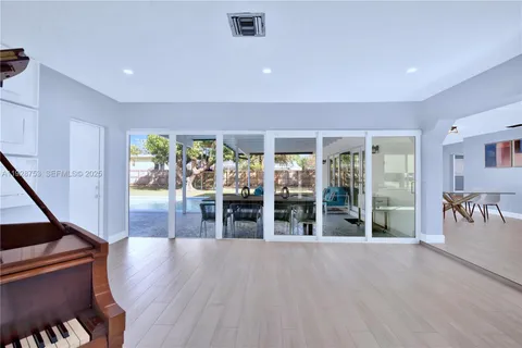 a view of dining room with wooden floor