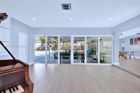 a view of dining room with wooden floor