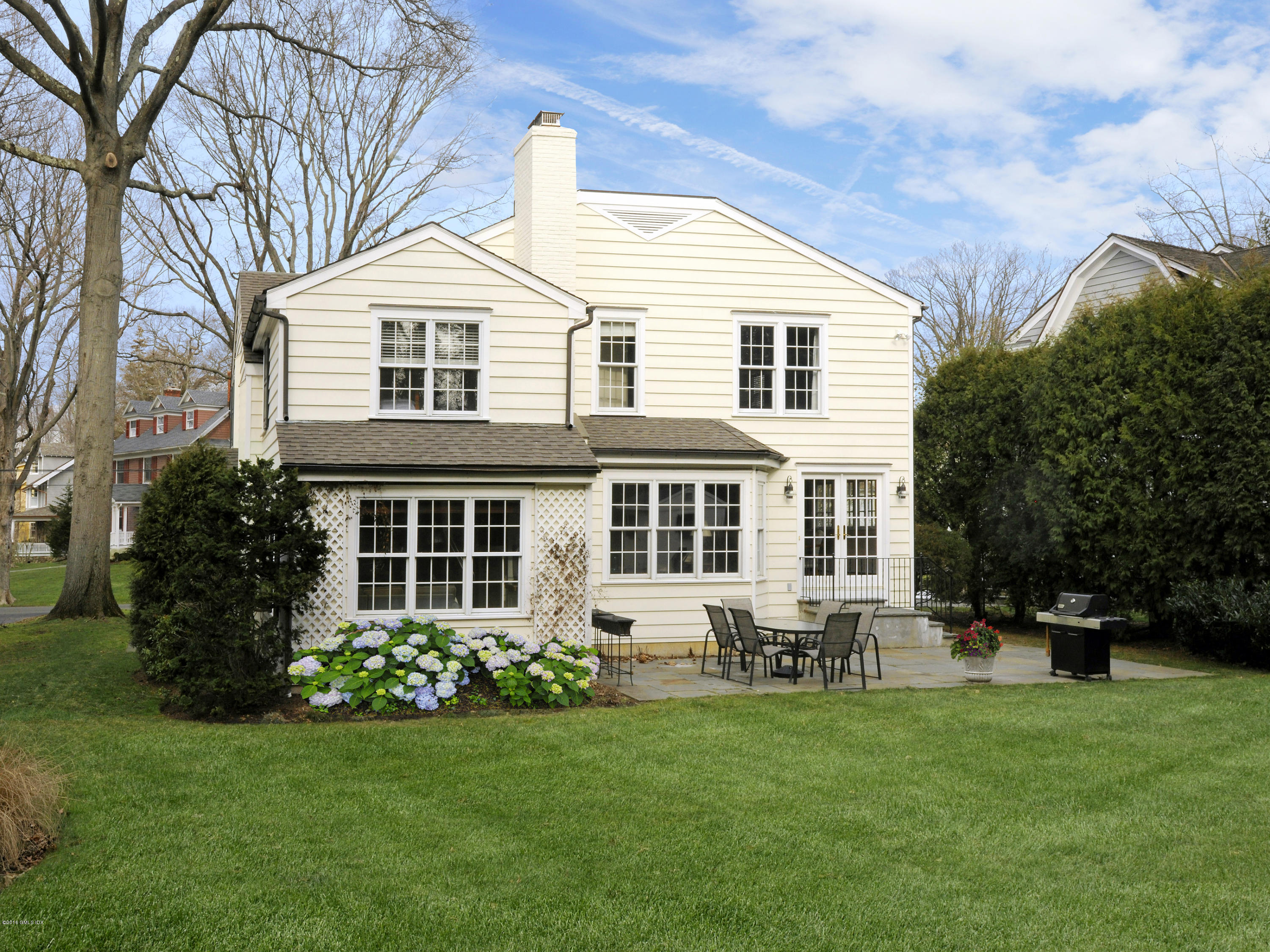 28 Lake Drive Riverside, CT 06878 - Photo 24 of 24 a front view of house with yard and green space
