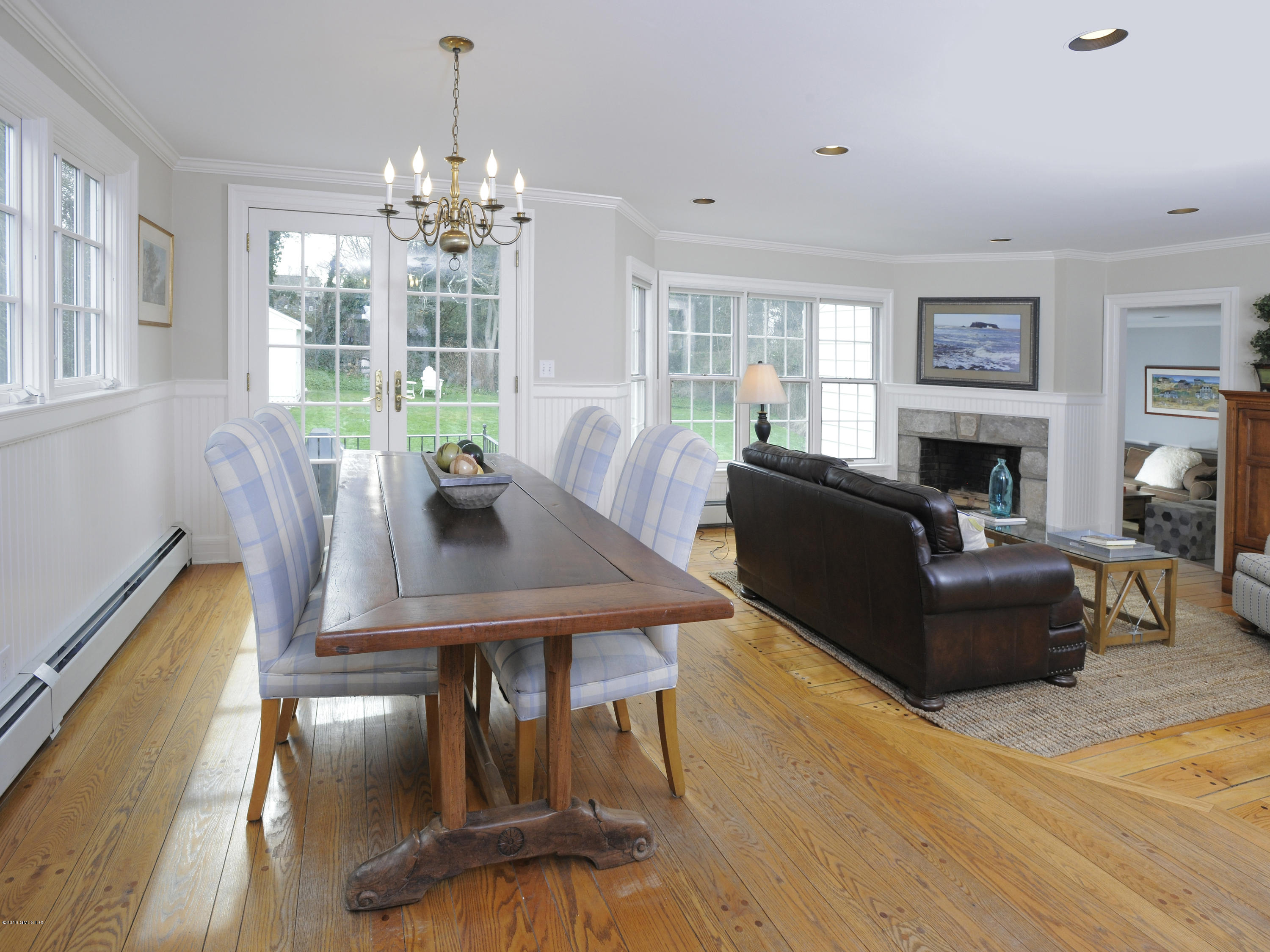 28 Lake Drive Riverside, CT 06878 - Photo 8 of 24 a view of a dining room with furniture window and wooden floor