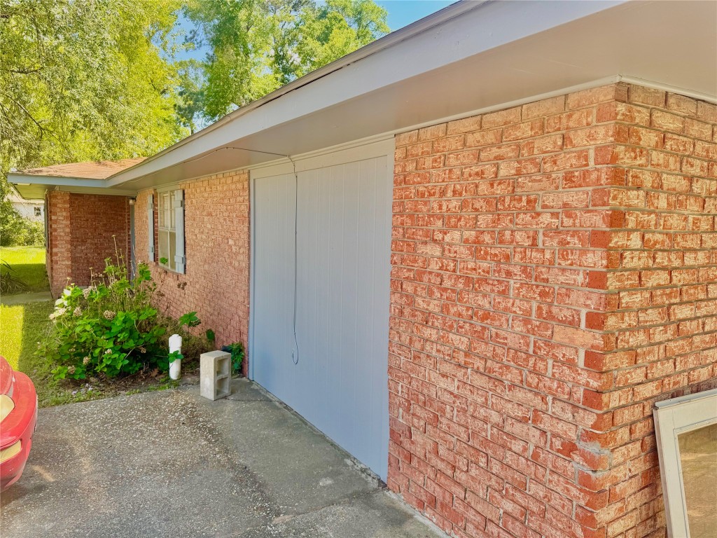 303 Charles Street Cleveland, TX 77327 - Photo 11 of 43 a view of a garden